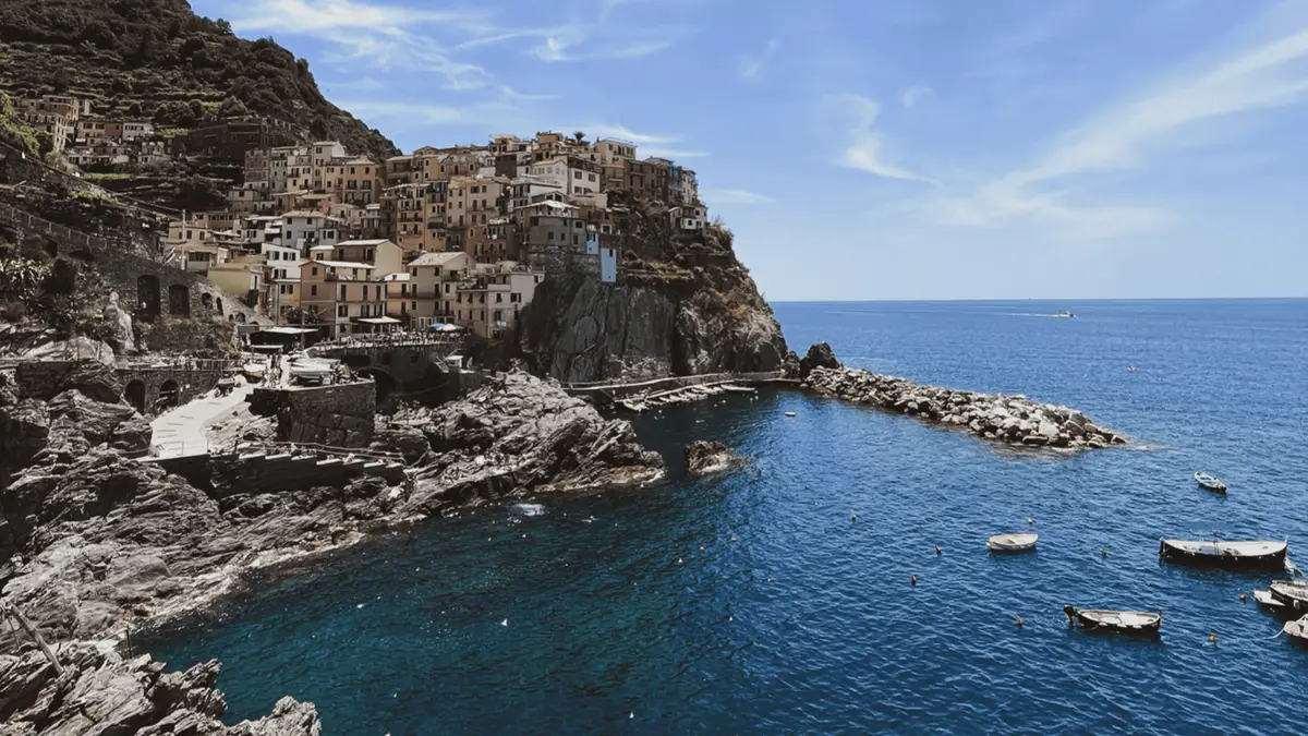 Boat tour cruising past the Cinque Terre villages from Porto Venere, with prosecco service on board