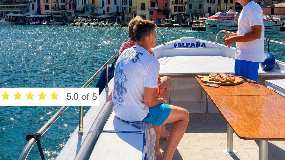 Boat cruise with wine and local food service off the coast of Portovenere at sunset